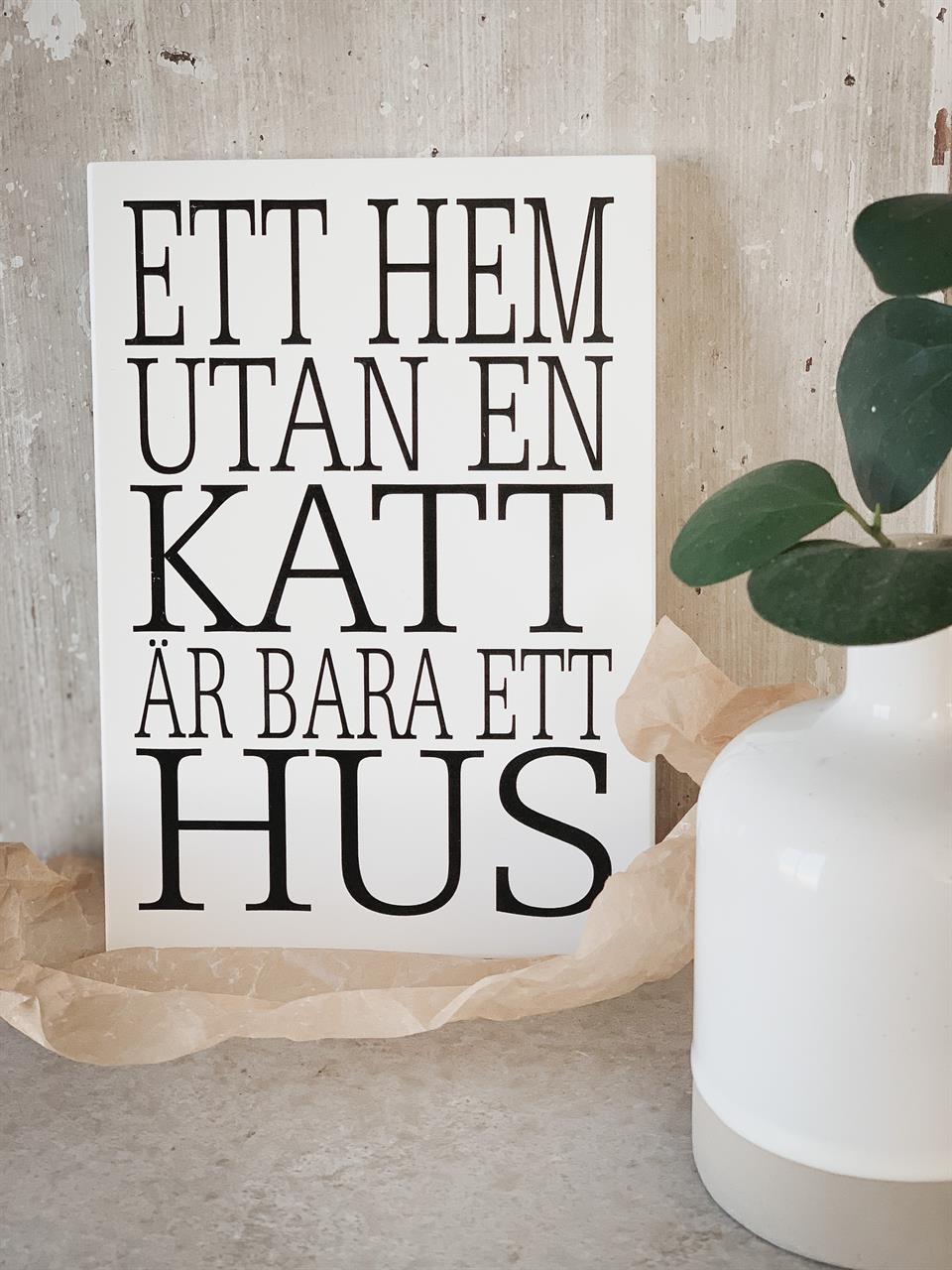 Skylt Ett hem utan en katt är bara ett hus